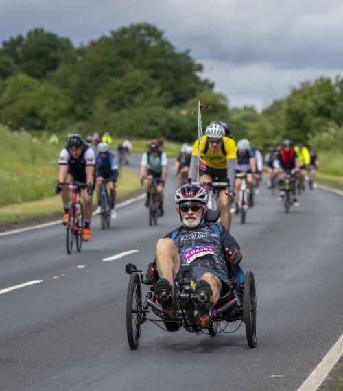 Man cycling an adaptive bike in the RideLondon event